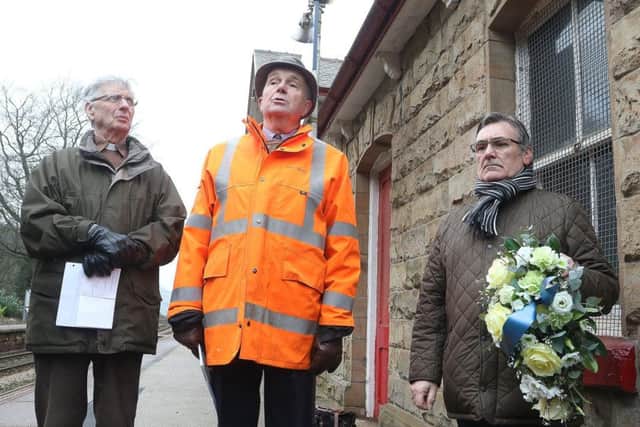 Marking the 60th anniversary of the Chapel rail disaster, John Brook (centre) of the Friends of Chapel Station and Rev Derrick Leach (left) led the ceremony