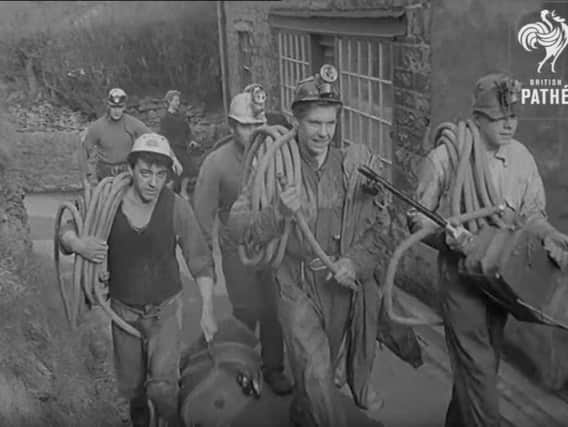 Volunteers took roped, machinery and oxygen tanks down the caves in a huge effort to save Neil Moss in 1959. (Image: British Path/YouTube)