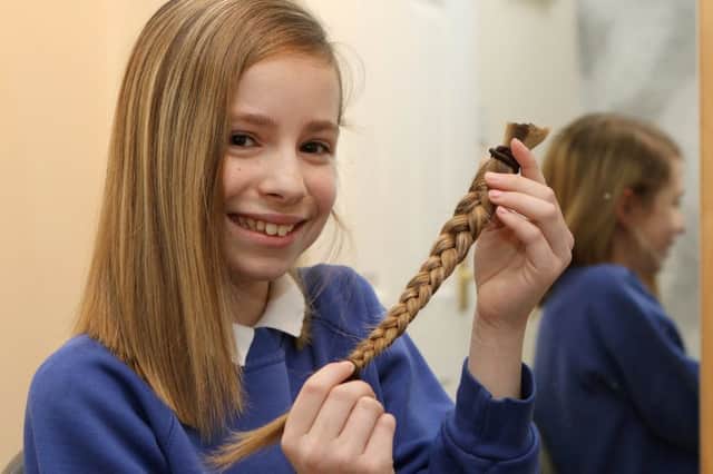 Donatinh herr hair to the Little Princess Trust elen year old Kalyse Garner