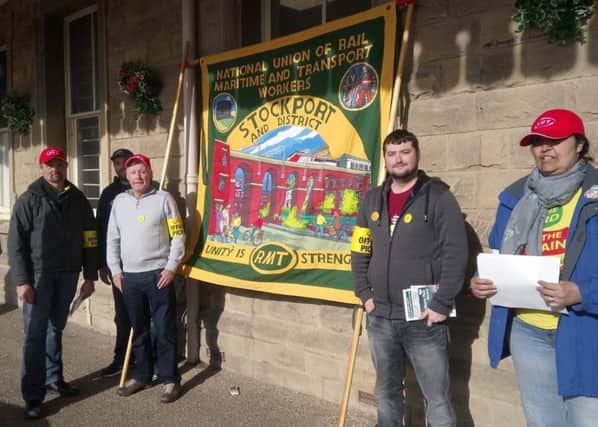 Picketers outside Buxton train station were taking part in a 24-hour strike at the possible loss of guards on trains.