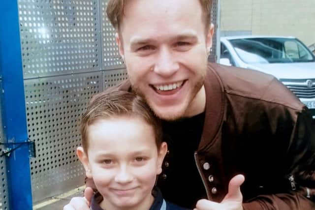 William meets Olly Murs.