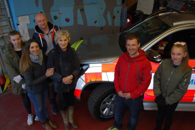 The new Buxton Mountain Rescue Team vehicle has been dedicated to the memory of the late team president, Ian Hurst, and was unveiled by Ian's widow Zan and her family, pictured here with BMRT Vehicle Officer, Matt Simmon.