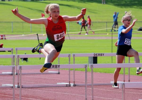 Freya Hatcher flies over the hurdles at Moorways.