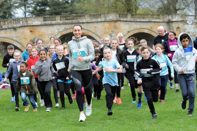 Jessica Ennis-Hill promotes the VitalityMove event with local school children at Chatsworth House on Monday.
