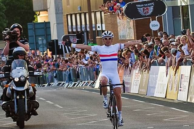 Dean Downing celebrates a victory on the road.