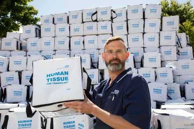 NHSBT nurse Marc Coe with empty transplant boxes.