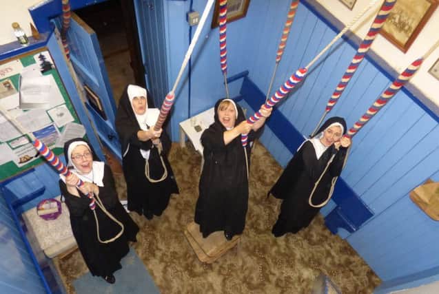 New Mills Amateur Operatic and Dramatic Society learn the ropes of bell-ringing in the run-up to their production of Sister Act at the New Mills Art Theatre from November 15 to 18.