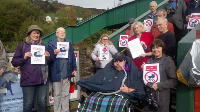 Campaigners have given an 800-strong petition to MP Ruth George to pass on to the Department of Transport in  abid to get better access at Chinley station.