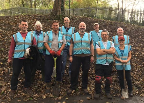 Buxton Town Team volunteers have planted 5,500 bulbs in Ashwood Park as part of their ongoing improvement campaign.