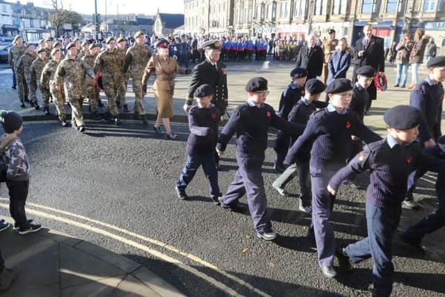 Buxton Remembrance, the parade marches to the war memorial