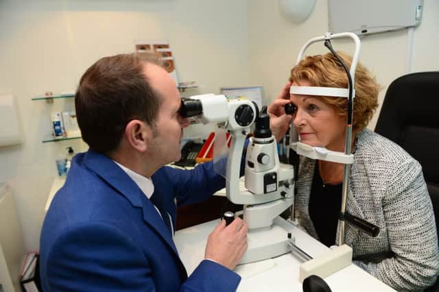 Vision Express store partner and optometrist Steven Pickering with Dr Penny Goldsborough