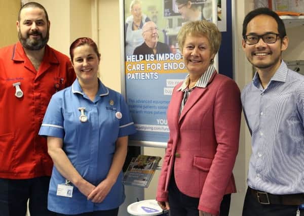 Nursing staff Steven Murphy, Beverley Murphy, patient Linda Carnall and consultant Dr Colin Kong.