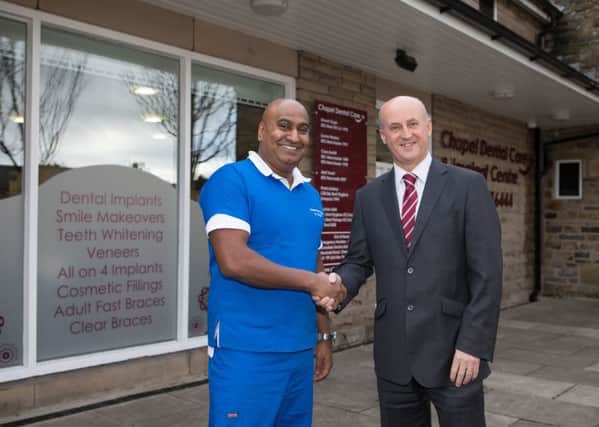Divesh Singh, Principal Dental Surgeon and owner of High Street Smiles, and Mike Scott, Relationship Manager at Yorkshire Bank. Photo contributed.