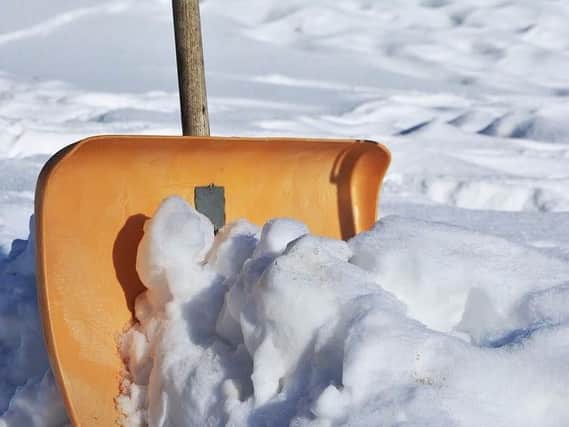 Many homeowners are concerned about clearing snow and ice from around their properties in case they are held responsible if someone falls.