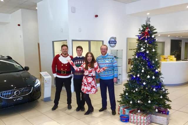 Jono Gould and his colleagues were feeling very festive at work Bristol Street Motors for Christmas Jumper Day