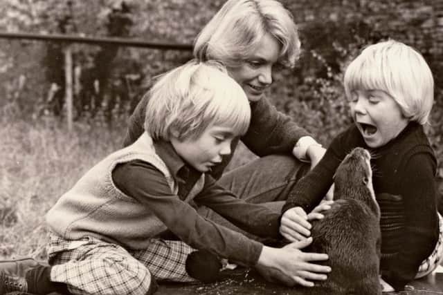 Carol Heap in 1976 with her two sons Charlie and Ed and the family's very first otter.