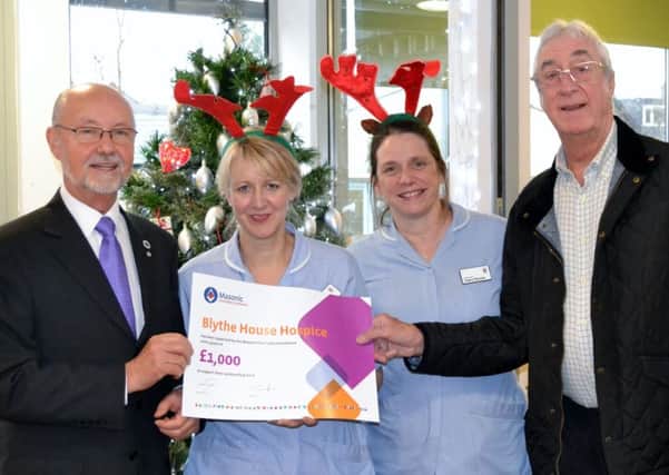 Masonic Charitable Foundation grants Â£1,000 to Blythe House Hospice. Pictured are Pictured are Graham Sisson from High Peak Lodge Freemasons, John Acton from Glossopdale Lodge Freemasons, Karen Clayton and Claire Rimmer from the Blythe House Living Well team
