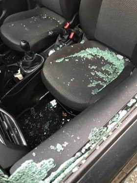 The window of the car parked on Windsor Road had been smashed and the bonnet tampered with