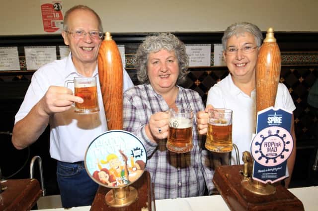 Chesterfield & District CAMRA Beer Festival at theMarket Hall Assembly Rooms. Pictured are Mick Portman, Jane Lefley, and Janet Portman.