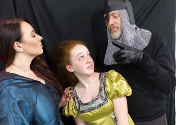 Emma Taylor as Chardonnay le Fay, Ellie Craufurd-Stuart as Princess Anna and Robbie Carnegie as The Black Knight in Buxton Drama League's production of Knight Fever.