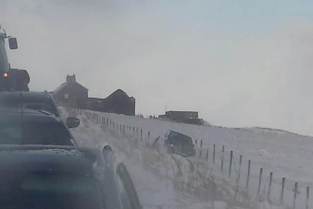 One vehicle ended up in a field. Photo: Owen Thompson.