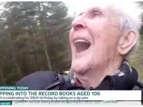 Jack Reynolds riding a zip wire on his 106th birthday. Picture: ITV.