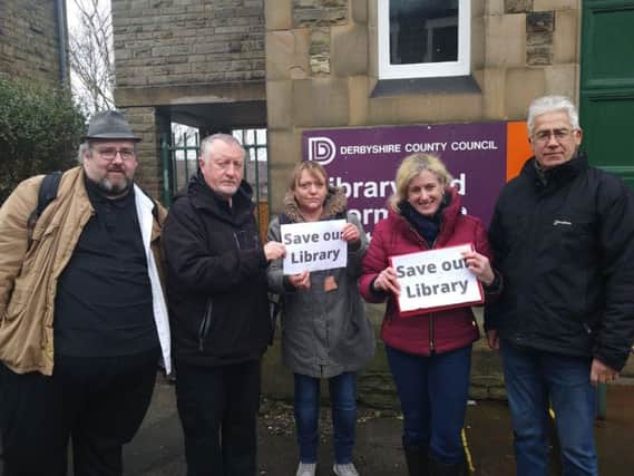 High Peak MP Ruth George, pictured with campaigners outside Hadfield Library.