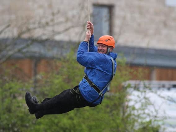 Local daredevil Canon David Truby experienced the zip wire on Friday. Picture by Jason Chadwick.