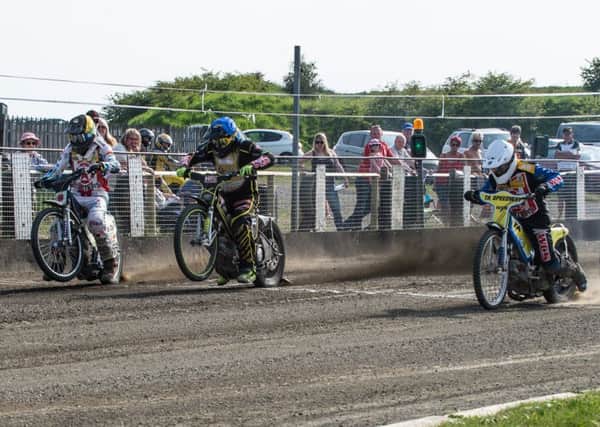 Photo by Ian Charles:

(l-r) Max Clegg (Yellow/Black), Tom Woolley (Blue), Tony Atkin (White) and Ben Wilson (Red) leave the start in Heat 15

Buxton Hitmen v Stoke Potters, National Trophy, Hi-Edge Raceway, Buxton,  20May 2018