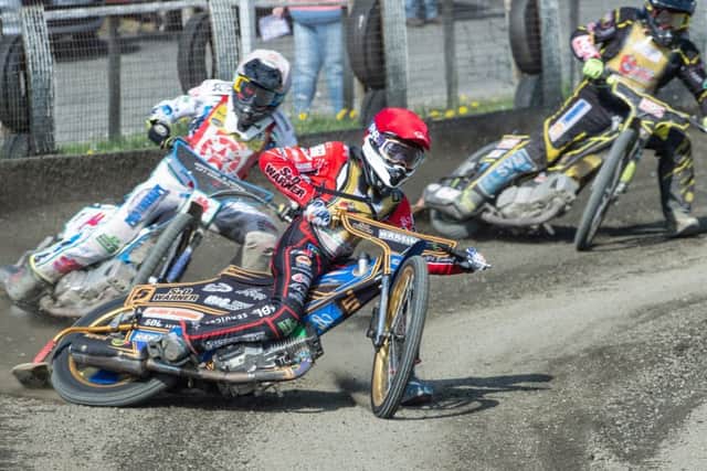 Photo by Ian Charles:

Anders Rowe (Red) leads Max Clegg (White) 

Buxton Hitmen v Stoke Potters, National Trophy, Hi-Edge Raceway, Buxton,  20May 2018