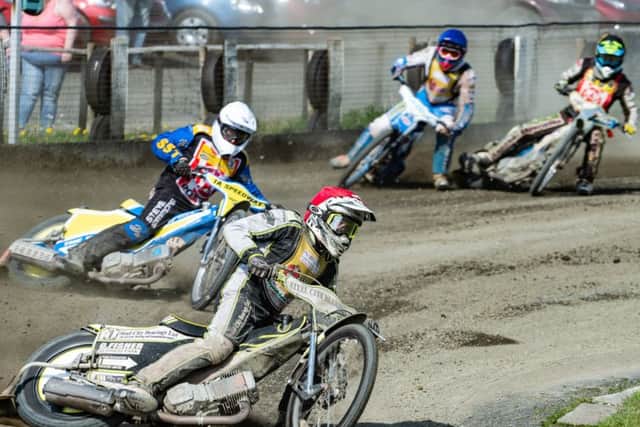Photo by Ian Charles:

Ben Wilson (Red) leads Tony Atkin (White), with Lewis Whitmore (Blue) and Adam Extance (Yellow/Black)

Buxton Hitmen v Stoke Potters, National Trophy, Hi-Edge Raceway, Buxton,  20May 2018